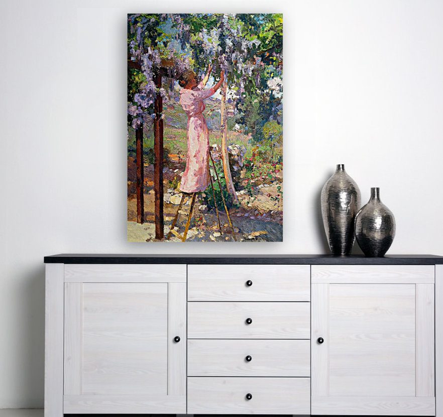 Photo of Lady in Trees Painting over a Simplistic Table